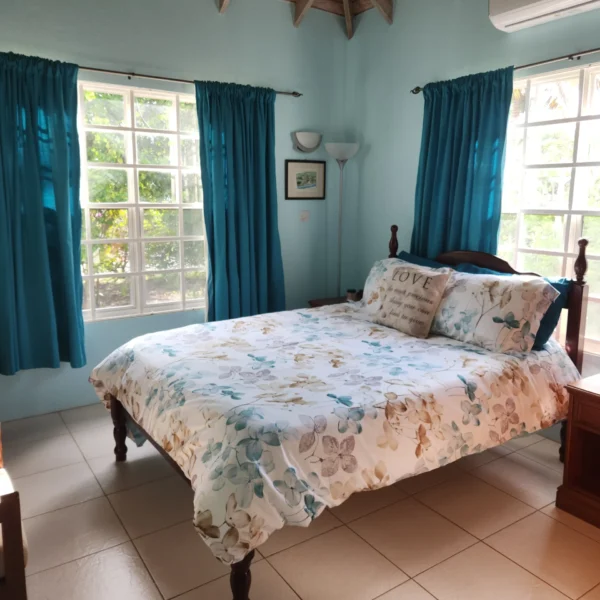 Queen-Bedroom-Garden-View.webp